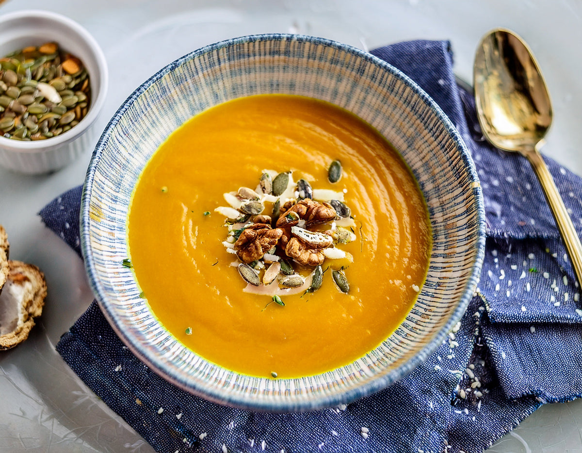 Pumpkin soup with roasted chestnuts and truffle oil Ⓥ