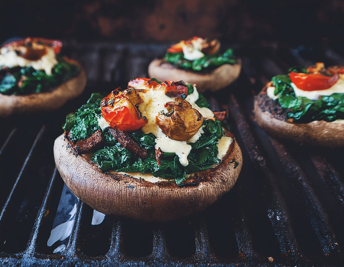 Gegrilde portobello paddenstoelen gevuld met spinazie, geitenkaas en zongedroogde tomaat | World of NIX