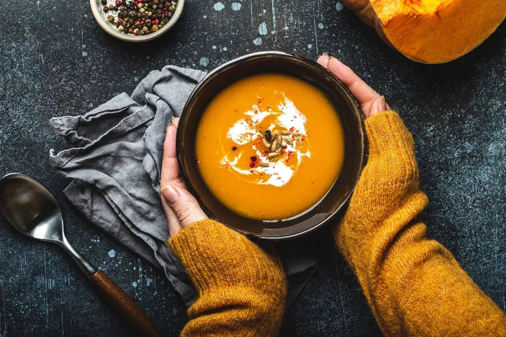 Pumpkin soup with roasted chestnuts and truffle oil Ⓥ