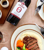 De fles Giesen Merlot die perfect past bij een mooi stuk vlees.
